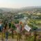 ISCG Travel professional guide leading tourists on a Georgia classic travel package walking tour in old Tbilisi
